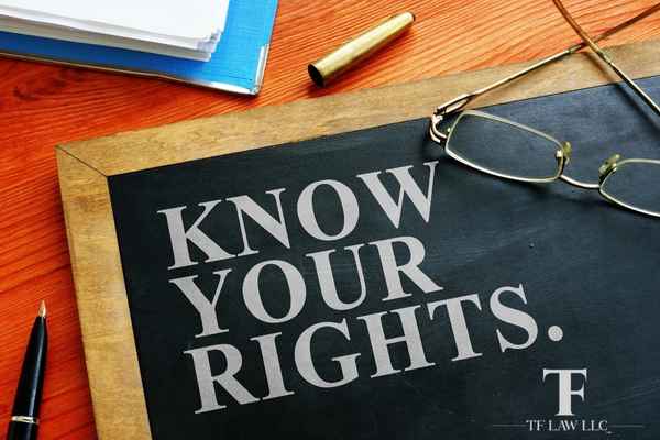 board on a desk that reads "know your rights" with writing utensils and glasses, Understanding Your Rights When Arrested